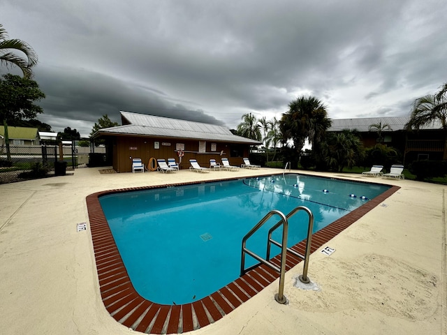 view of pool featuring a patio