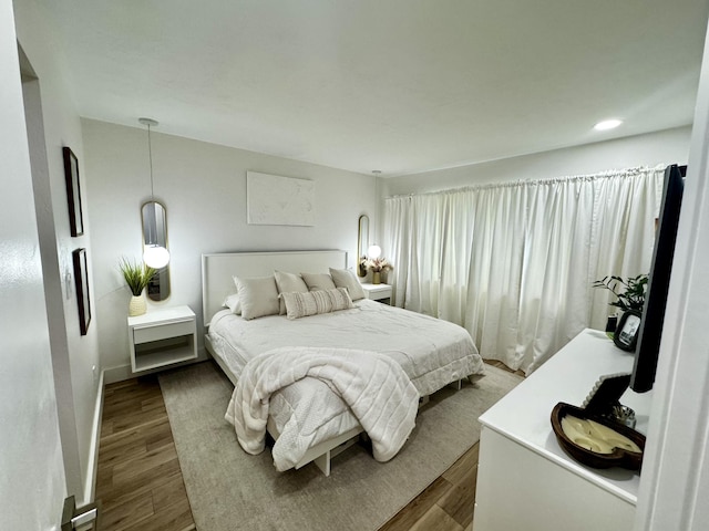 bedroom featuring hardwood / wood-style flooring