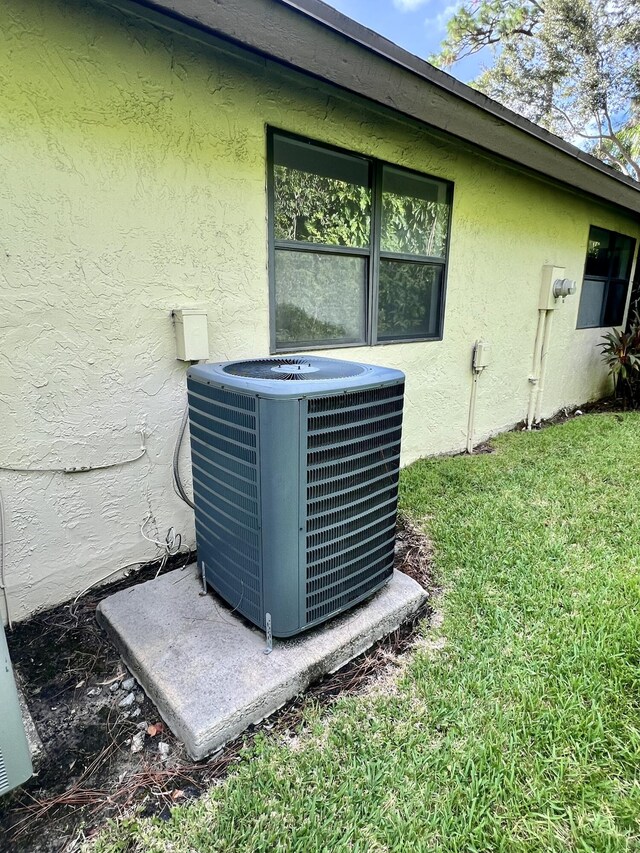 exterior details with central air condition unit