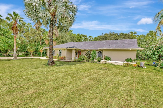 ranch-style house with a front yard