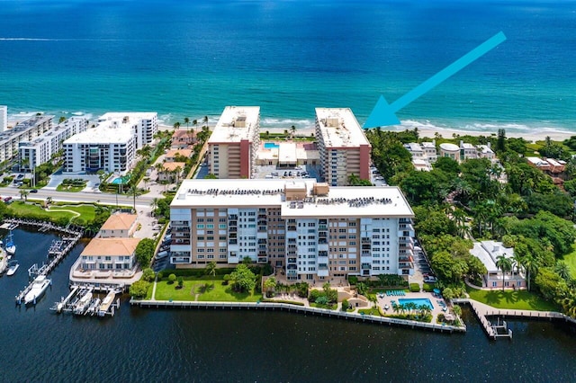 birds eye view of property featuring a water view