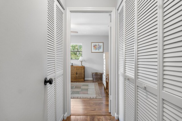 hallway featuring wood-type flooring