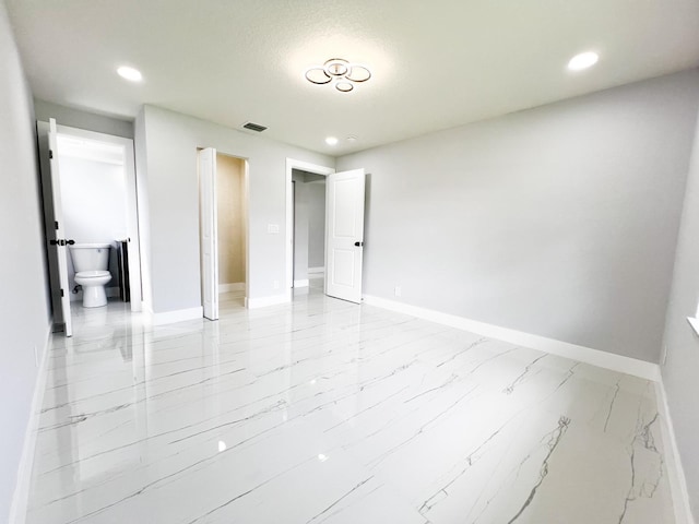 spare room featuring a textured ceiling