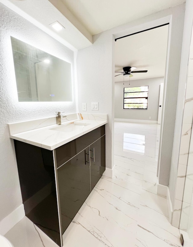 bathroom featuring vanity and ceiling fan