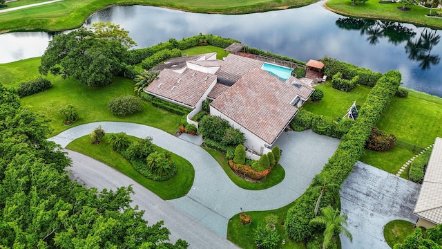 drone / aerial view with a water view