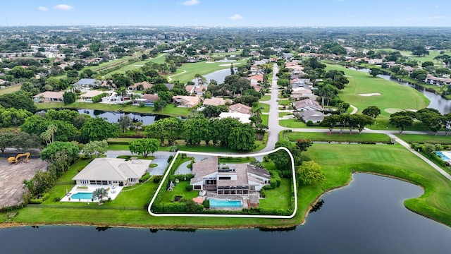 aerial view featuring a water view, a residential view, and golf course view