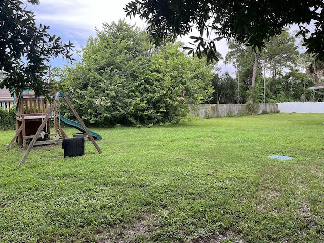 view of yard with a playground