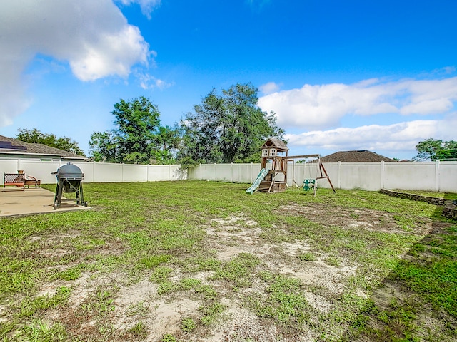 view of yard featuring a playground