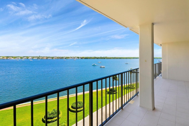 balcony featuring a water view