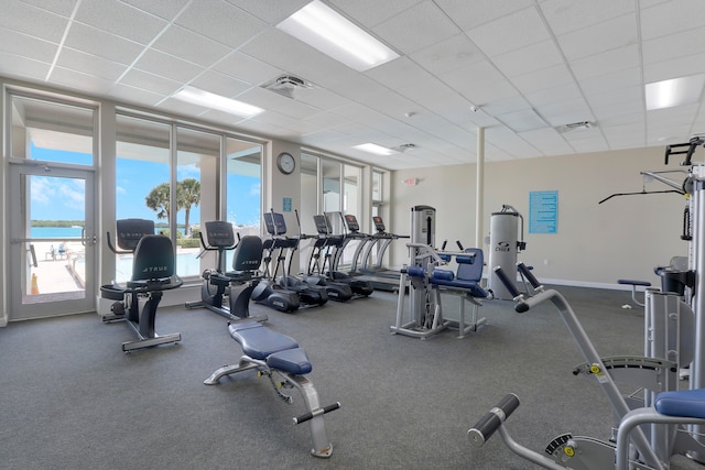 workout area with a drop ceiling