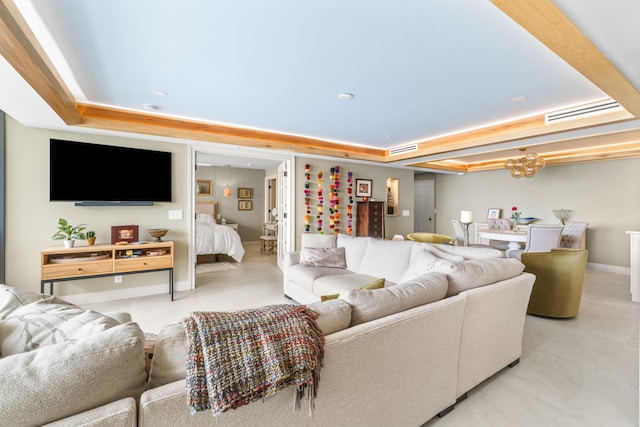 living room with a tray ceiling