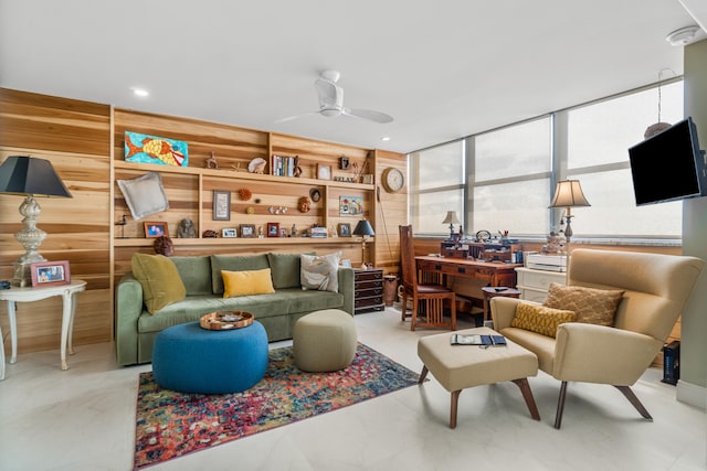 living area featuring ceiling fan