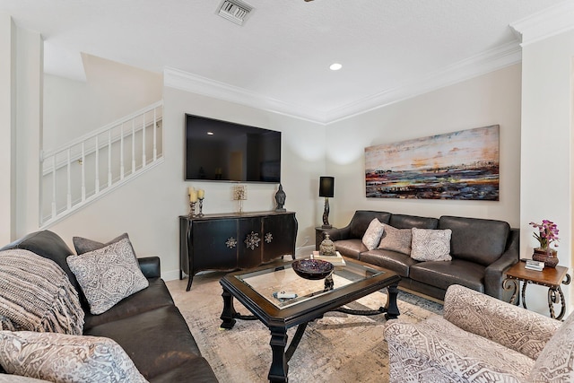 living room featuring crown molding