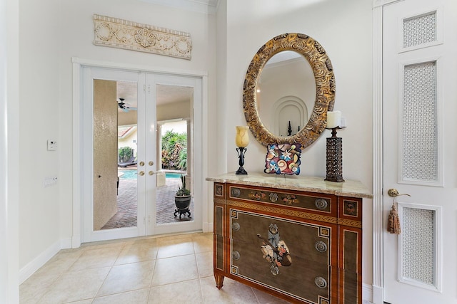 tiled entrance foyer with french doors