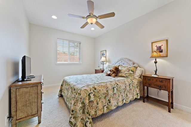 carpeted bedroom with ceiling fan