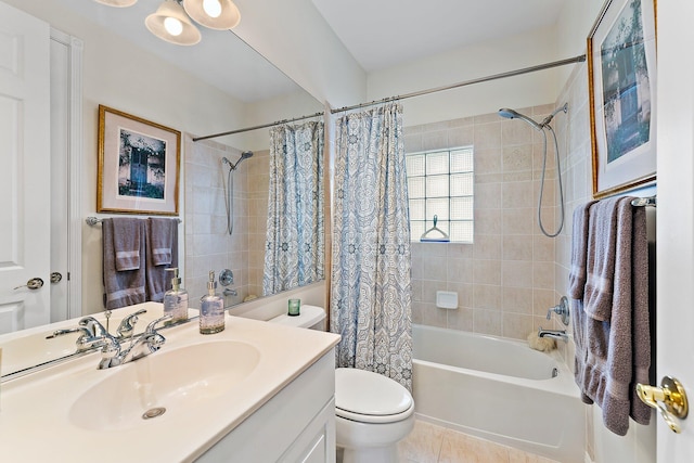 full bathroom featuring shower / bathtub combination with curtain, tile patterned floors, vanity, and toilet