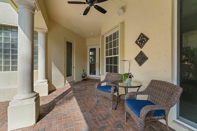 view of patio / terrace featuring ceiling fan