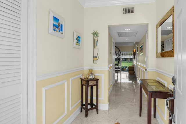 corridor featuring crown molding