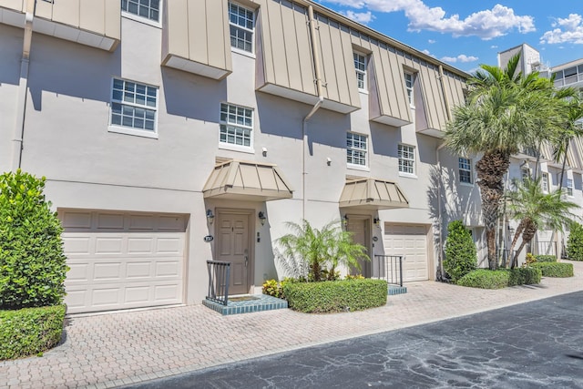 view of property with a garage