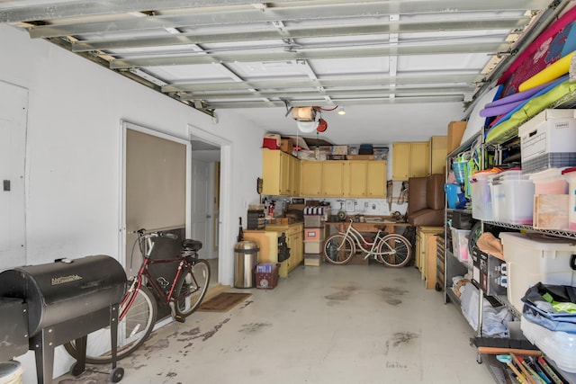 garage featuring a garage door opener