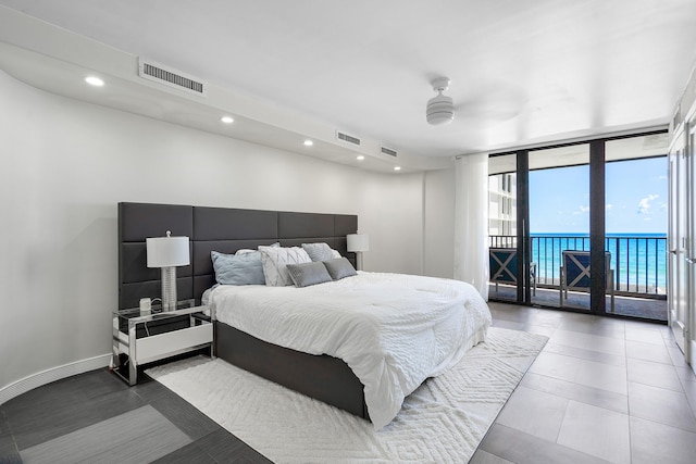 bedroom featuring ceiling fan, access to outside, and tile patterned floors