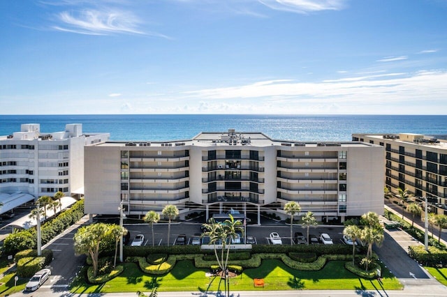 view of building exterior with a water view