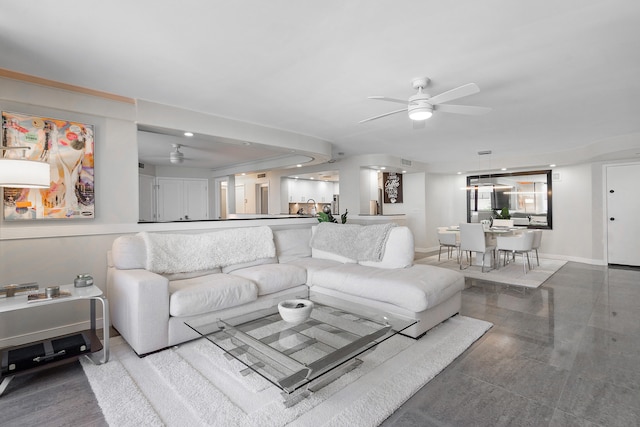 living room featuring ceiling fan