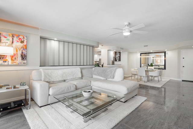 living room featuring ceiling fan