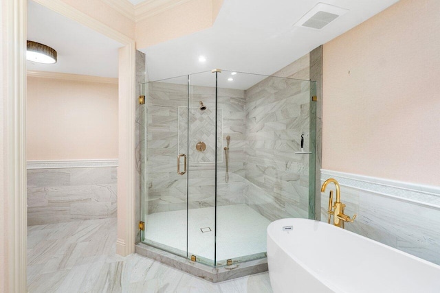 bathroom featuring crown molding, plus walk in shower, and tile walls