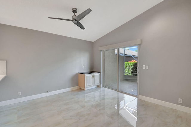 spare room with high vaulted ceiling and ceiling fan