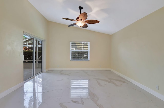 empty room with a wealth of natural light, ceiling fan, and lofted ceiling