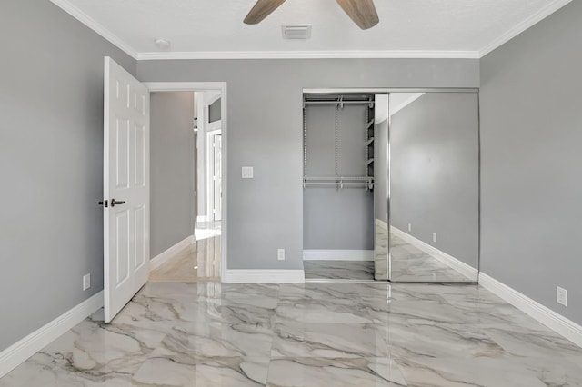 unfurnished bedroom with a closet, ceiling fan, and crown molding