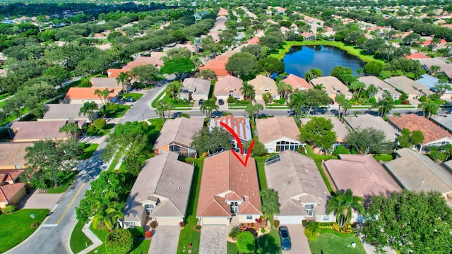 drone / aerial view with a water view