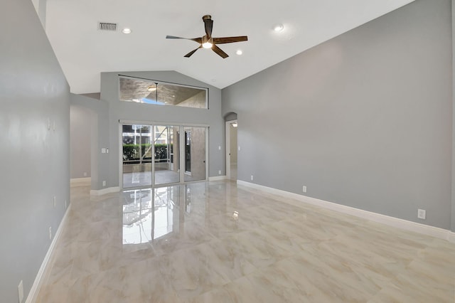 spare room featuring high vaulted ceiling and ceiling fan