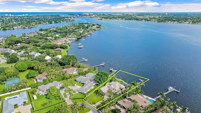 birds eye view of property featuring a water view