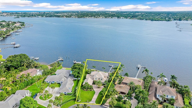 drone / aerial view with a water view