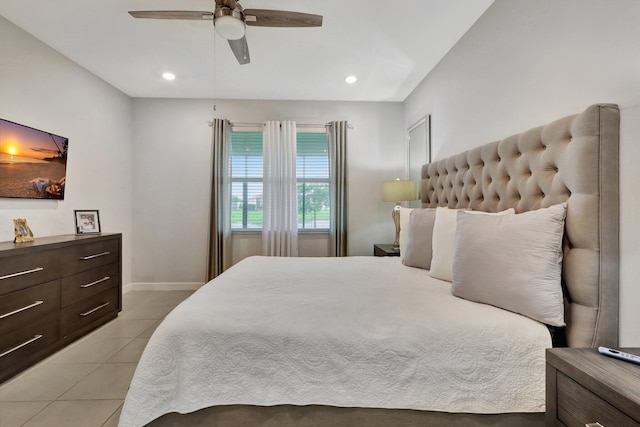 bedroom with light tile patterned floors and ceiling fan