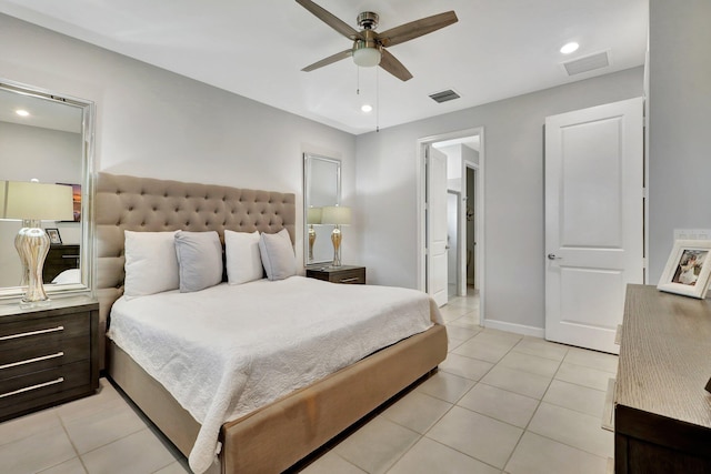 tiled bedroom featuring ceiling fan