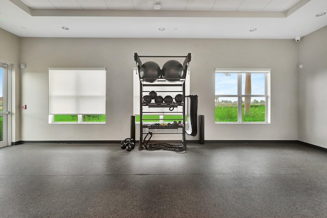 interior space with a tray ceiling