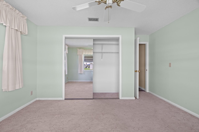 2078 SW 13th Ter, Boynton Beach, FL 33426 - unfurnished bedroom featuring carpet flooring, baseboards, and a textured ceiling