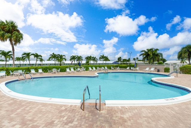 2078 SW 13th Ter, Boynton Beach, FL 33426 - community pool featuring a patio area