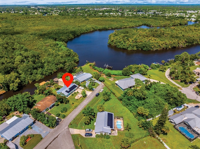 birds eye view of property featuring a water view