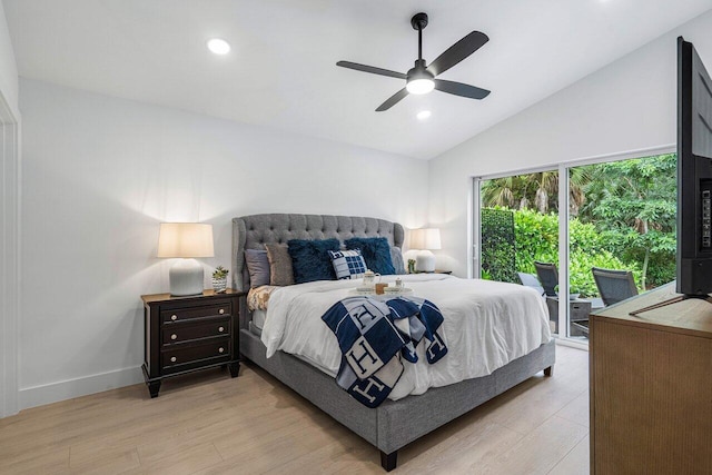 bedroom with light hardwood / wood-style floors, ceiling fan, vaulted ceiling, and access to outside