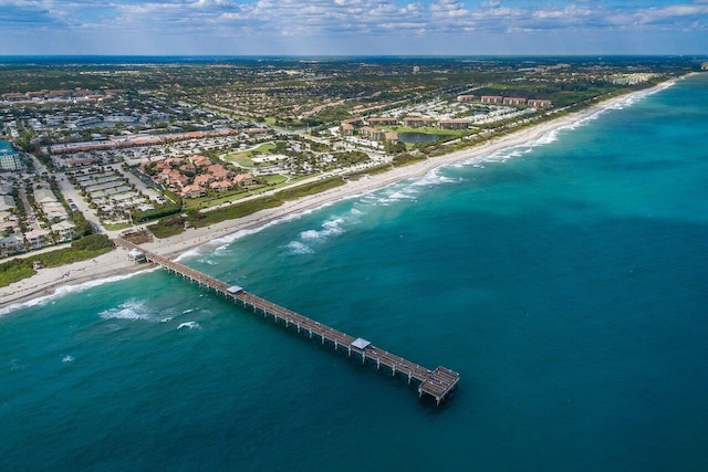 aerial view with a view of the beach and a water view