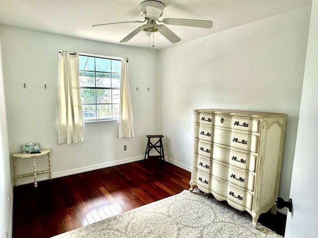 bedroom with wood-type flooring and ceiling fan