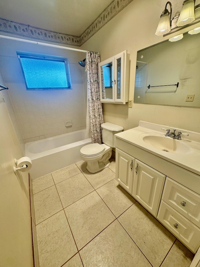 bathroom featuring toilet, tile patterned flooring, shower / bath combination with curtain, and vanity