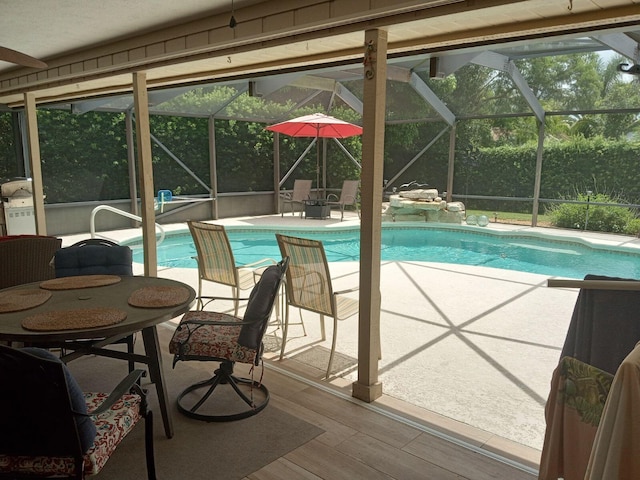 view of pool featuring a lanai and a patio area