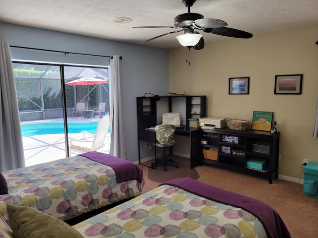 carpeted bedroom featuring access to outside, ceiling fan, and a textured ceiling