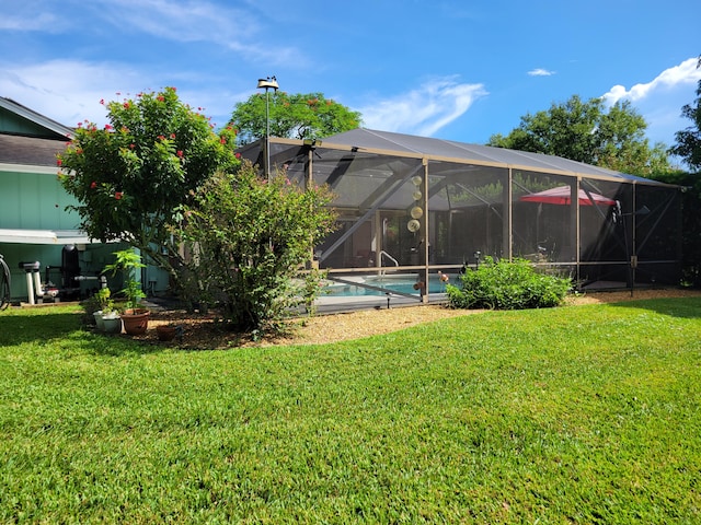 view of yard featuring a lanai