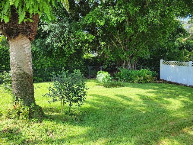 view of yard featuring fence